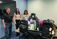 Wayne J. Griffin Electric, Inc. donates backpacks and school supplies to local students
